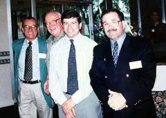 A slate of CoSIDA Hall of Famers pictured at the 1995 ECAC-SIDA Workshop in Saratoga Springs, NY. (L-R) Bob Kenworthy (Gettysburg), Bill Esposito (St. John’s), Jones, Howie Davis (Massachusetts).